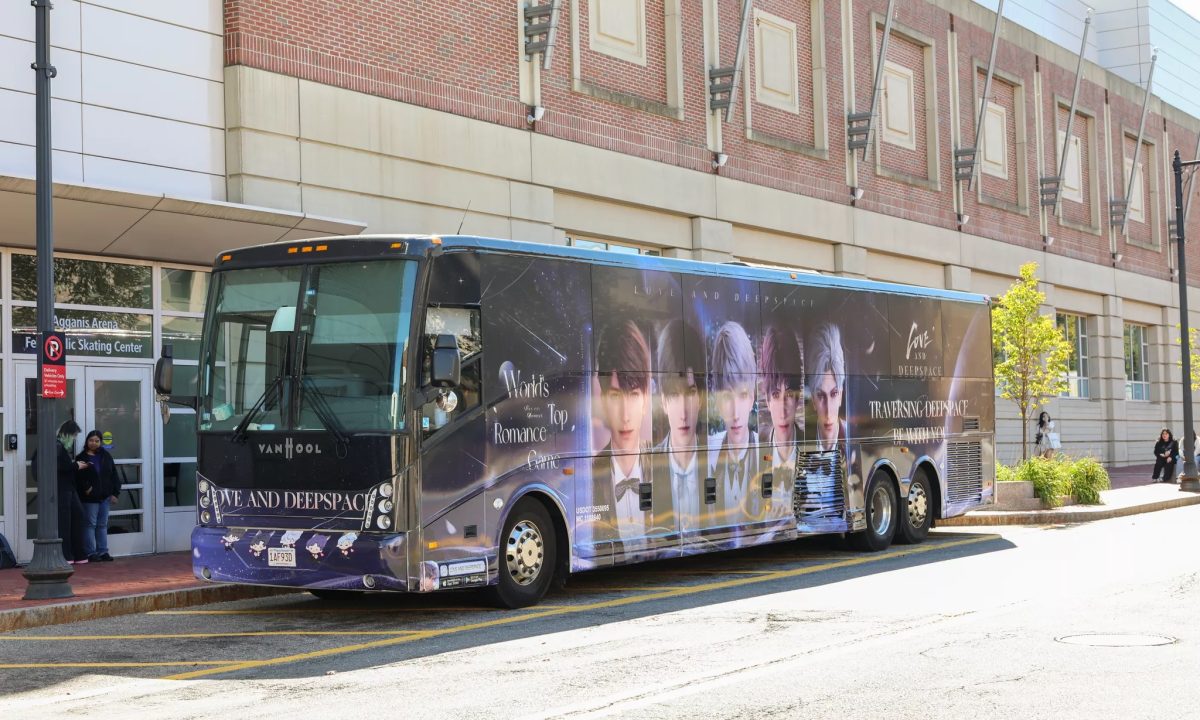 Bus Wrap Inc. full coach wrap for Love and Deepspace in Boston, MA with vibrant cosmic-themed graphics
