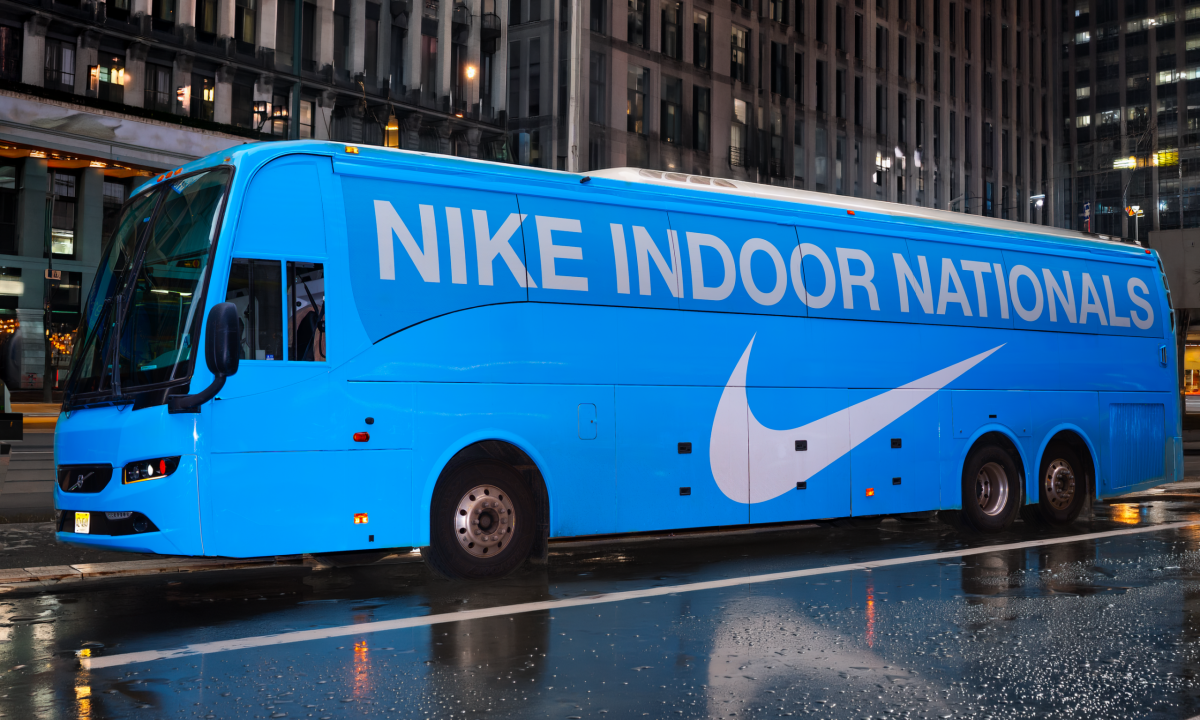 Custom full coach bus wrap by Bus Wrap Inc. for Nike Indoor Nationals in New York City showcasing high-impact branding and eye-catching mobile advertising graphics