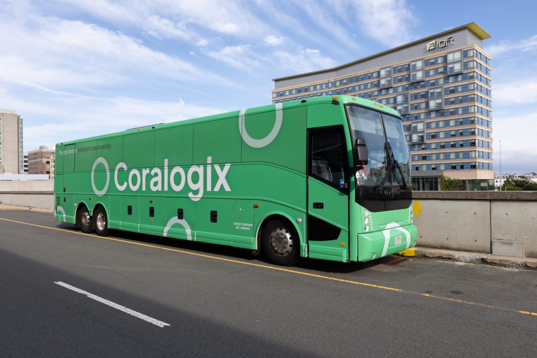 Bus Wrap Inc. full coach wrap for Coralogix in Boston with clean modern branding