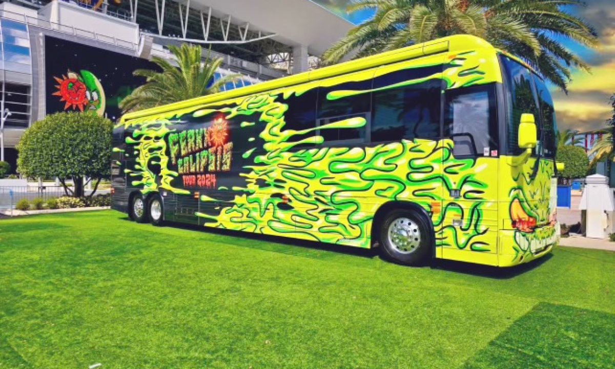 Bus Wrap Inc. full tour bus wrap for Feid Ferxxo fan experience across the United States with vibrant graphics