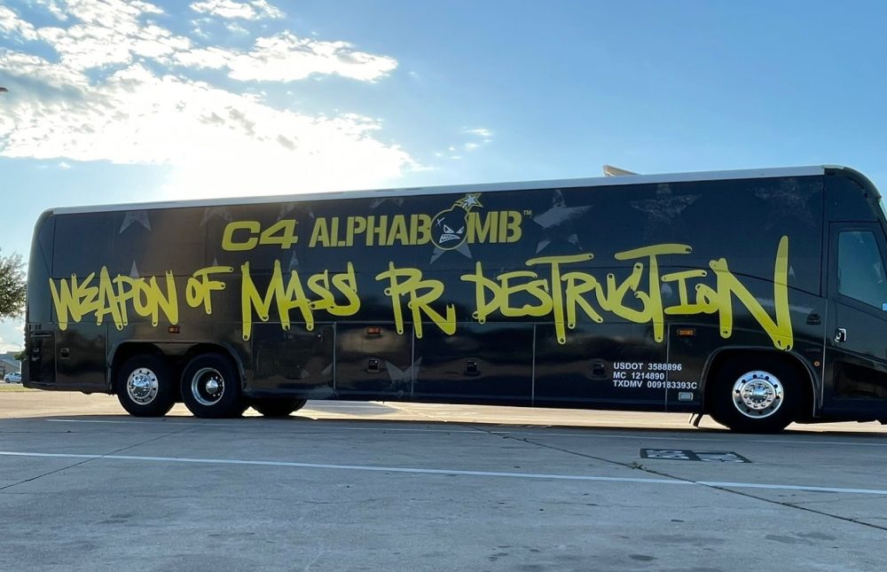 Bus Wrap Inc. full coach wrap for C4 Energy Nutrabolt event in Texas with high-impact branded graphics